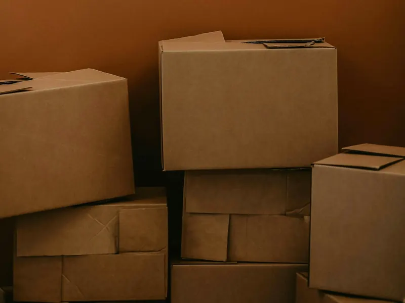 Stack of plain kraft cartons, ready for your brand