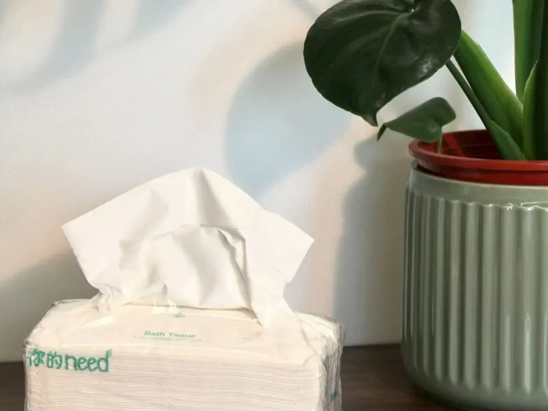 3-ply pull-out toilet tissue pack with a sheet pulled up